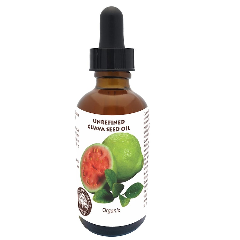 May include: A glass bottle with a dropper top filled with unrefined guava seed oil. The bottle has a white label with the words "Unrefined Guava Seed Oil" and "Organic". The label also features a picture of a guava fruit.
