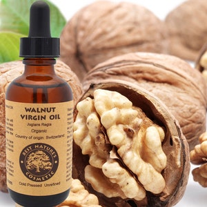 Olio di noce vergine (biologico, spremuto a freddo, non raffinato) per una pelle e dei capelli dall&#39;aspetto radioso.