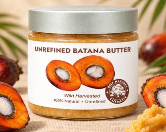 May include: A glass jar of unrefined Batana butter with a silver lid. The white label features the text "UNREFINED BATANA BUTTER," "Wild Harvested," "100% Natural," and "Unrefined," alongside an illustration of two sliced orange palm fruits.