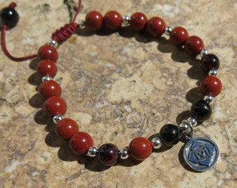 Root Chakra charm bracelet - Muladhara. Sterling silver, Garnet, Red Jasper, Jet gemstones. Adjustable closure