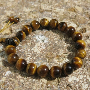 Tigers Eye Wrist Mala. 18 beads, 10mm. Mantra meditation.  Adjustable closure. Accomplishing Goals, Self-worth, Creative Energy