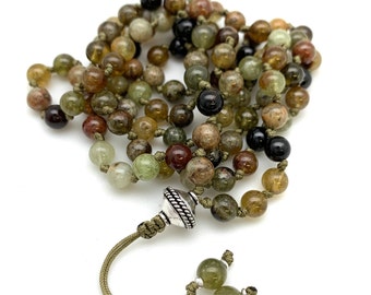 Green Garnet 6mm hand knotted mala prayer beads. Sterling Silver guru bead and accents. Adjustable mala