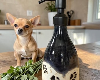 Wheel Thrown Ceramic Soap Dispenser with Paw Prints and Flowing Bluish-Black Glazing