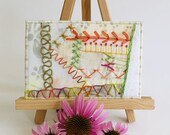 Crazy Quilt Hand Embroidered Postcard, Cream Orange and Green Fabric Postcard, Fibre Art Postcard, Textile Art Postcard