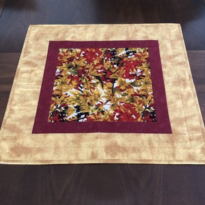 Falling Leaf Trail Quilted Table Topper NCU0NNT1025