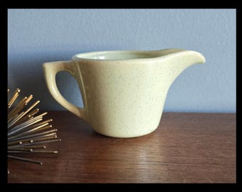 MCM yellow speckled ceramic creamer by Bauer.