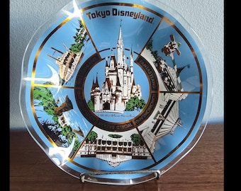 Vintage Tokyo Disneyland ruffled glass souvenir dish.