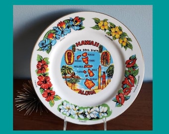 Large vintage souvenir Aloha Hawaii plate featuring the flowers of Hawaii.
