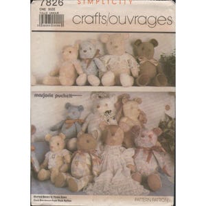 May include: A white ceramic mug with a black handle and the text "But First, Coffee" in a black, bold font. The mug is on a white surface.