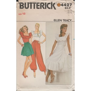 May include: Vintage sewing pattern for a women's skirt and top by Butterick, pattern number 4427, size 10, designed by Ellen Tracy. The pattern features a white top with a ruffled neckline and a white skirt with a ruffled hem.