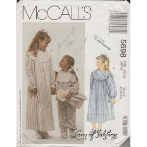 May include: McCall's sewing pattern featuring three girls' nightgown and pajama designs. The pattern includes a long-sleeved nightgown, a pajama set, and a knee-length nightgown, all with a ruffled collar and vertical striped pattern. Size Large (12,14).