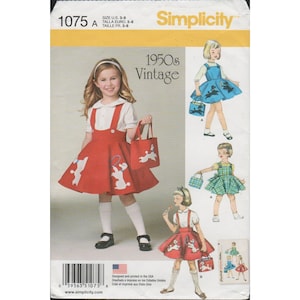 May include: Simplicity pattern 1075 A for girls' vintage dresses, sizes 3-8. The pattern features a red dress with white poodle appliques, a matching tote bag, and a white collared shirt. The package includes illustrations of the finished dresses.