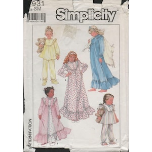 May include: Simplicity sewing pattern for children's sleepwear. The pattern features various pajama and nightgown designs, including long-sleeved tops and pants, and a long nightgown with a ruffled hem. The cover shows illustrations of the finished garments.