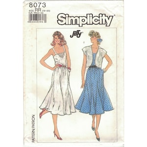 Peut inclure: Patron de couture Simplicity numéro 8073 pour une robe Jiffy, tailles 14 à 20. Le patron comprend les instructions pour une robe blanche sans manches avec un col rond et une robe à pois bleus avec un haut blanc sans manches.