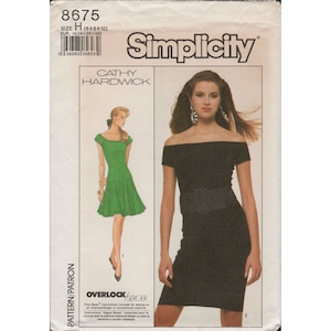 May include: Simplicity sewing pattern number 8675 for a dress with an off-the-shoulder neckline. The pattern includes instructions for using an overlock or serger sewing machine. The pattern is for sizes 6, 8, and 10. The pattern is for European sizes 34, 36, and 38.
