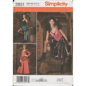 May include: Simplicity sewing pattern with three costume designs. The costumes include a black and pink corset dress, a red gown, and a black corset with a teal skirt. The pattern includes sizes 6, 8, 10, and 12.