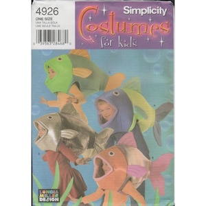 May include: A Simplicity sewing pattern envelope 4926 for children's costumes featuring four fish-shaped headpieces in lime green, purple, silver, and orange. The cover displays the text Costumes for kids and Longia Miller Design against a blue background.