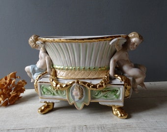 Antique Putti  Planter in fine porcelain marked with two swords R.B./Cherub Planter Old.