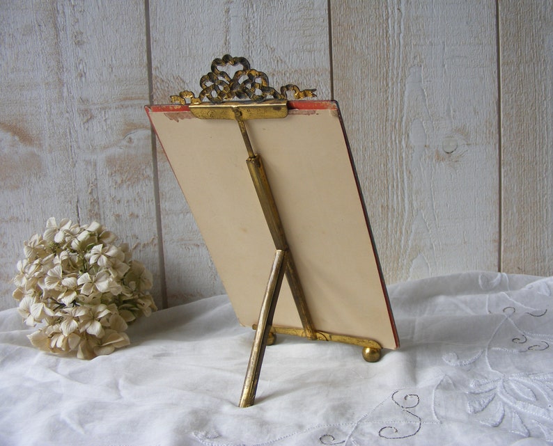 Antique Glass and Brass Photo Frame.Portrait of child.End of the 19th century.
