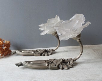 Art Deco Silvered Bronze Wall Sconces with white  glass shades in the shape of roses.