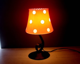 Vintage Table Lamp 1960s,with a red glass shade with white dots.