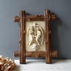 Antique  Meerschaum Reliquary signed ,in carved wood frame.