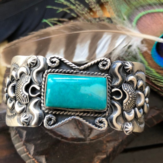 Magnificent turquoise and  sterling Navajo repousse hand stamped cuff