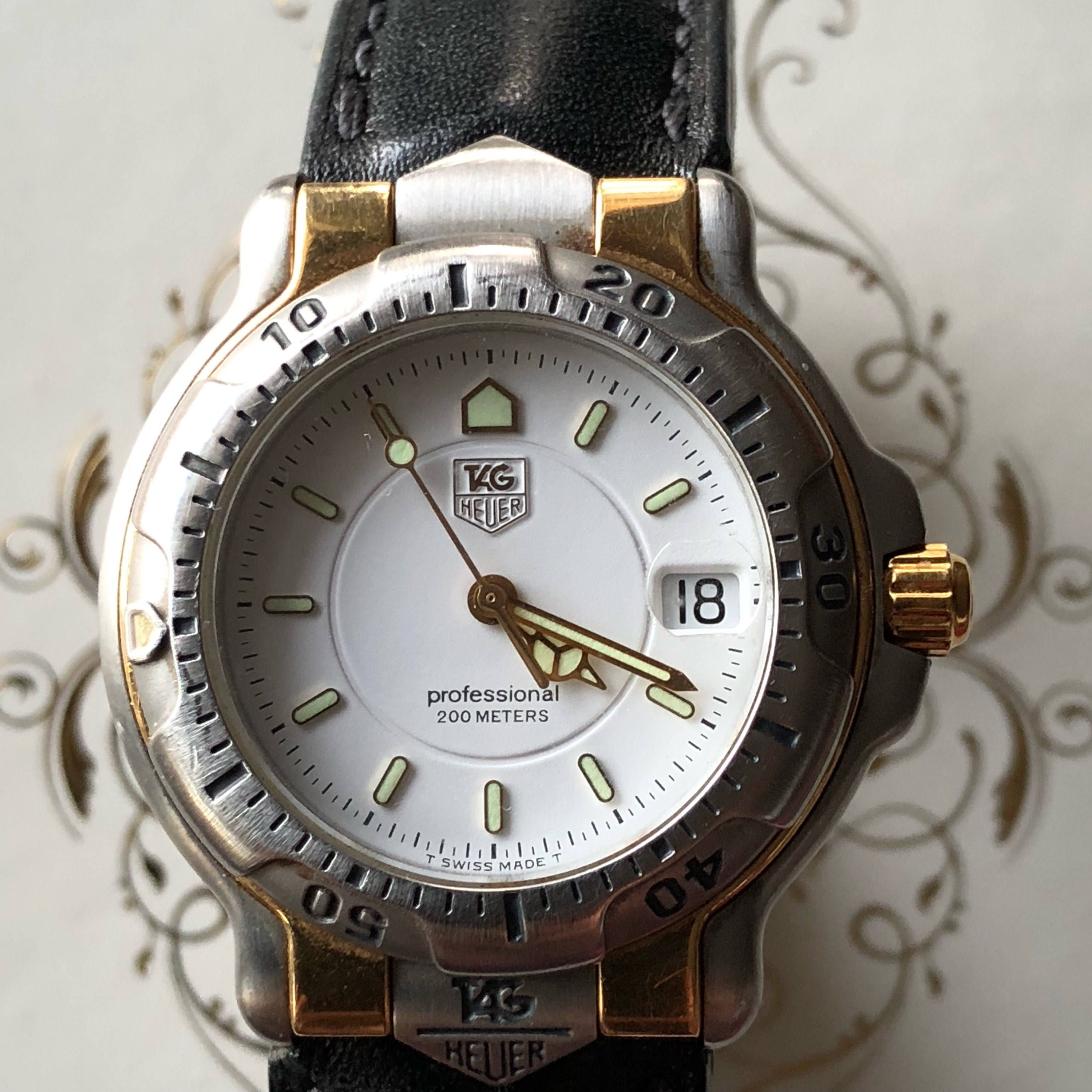 Vintage Tag Heuer 6000 series Unisex mid size stainless and 18kt gold