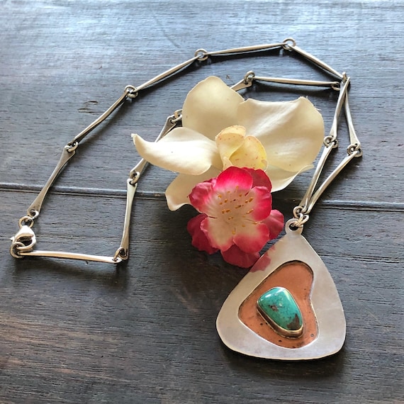 A beautiful handmade studio sterling,copper and turquoise necklace