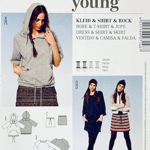 Puede incluir: Un patrón de costura Burda Young para vestido, camiseta y falda. La imagen muestra a una mujer con una sudadera con capucha gris y una falda. Tallas: 32-44 (EUR) y 6-18 (US).