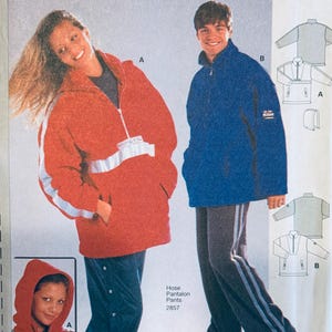 May include: A Burda sewing pattern featuring a red hooded jacket with white stripes and a blue jacket with matching pants. The pattern includes shirt and t-shirt designs. The text on the pattern reads "The New Burda".