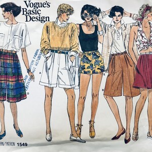 May include: A vintage sewing pattern for five different styles of shorts. The pattern is called "Vogue's Basic Design" and the pattern number is 1549. The shorts are shown in a variety of colors and fabrics, including plaid, white, yellow, brown, and red.