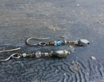 Mismatched delicate intricate dangly earrings made from antique and salvaged beads