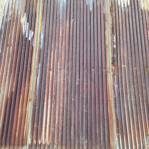 Chocolate Rust With White and Orange Reclaimed Corrugated Metal Roofing ...