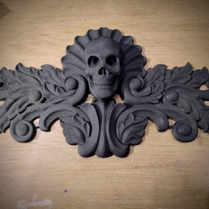 Skull furniture applique