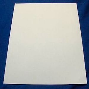 May include: A blank white sheet of paper.