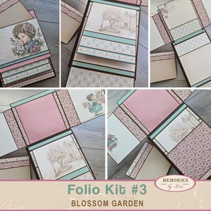 Può includere: Un kit di folio in carta intitolato Blossom Garden, caratterizzato da cartoncino con motivi color crema, rosa e turchese con illustrazioni di una persona e un albero. Il kit include varie sezioni pieghevoli, bordi decorativi e spazi vuoti.