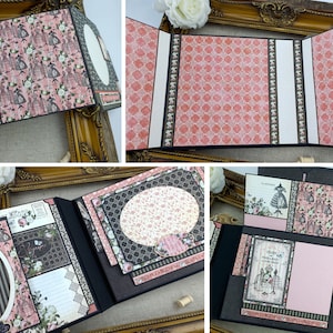Op de afbeelding: Een zwart scrapbook met roze en wit gepatroneerd papier, met een bloemenontwerp en een decoratief ovaal frame. Het scrapbook is open om een pagina te onthullen met een handgeschreven notitie en een decoratieve vlinder.