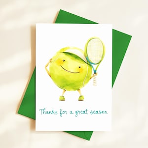 May include: A greeting card featuring a cartoon tennis ball character holding a tennis racket. The tennis ball is wearing a visor and sneakers. The card has the text "Thanks for a great season" in teal, and is inside a green envelope.