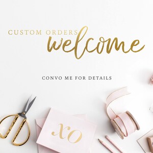 May include: A flat lay image with a pink background and gold lettering that says "CUSTOM ORDERS welcome CONVO ME FOR DETAILS". There are various craft supplies, including scissors, ribbon, and a small wooden box with the words "TRUE LOVE" on it.