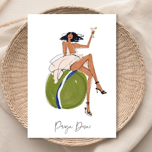 Può includere: Una stampa d'arte rettangolare bianca con un'illustrazione stilizzata di una persona dai capelli scuri seduta su una grande palla verde con una striscia blu. La persona indossa un indumento bianco e tiene in mano un bicchiere da cocktail rosa. Il testo Priya Desai è in basso.