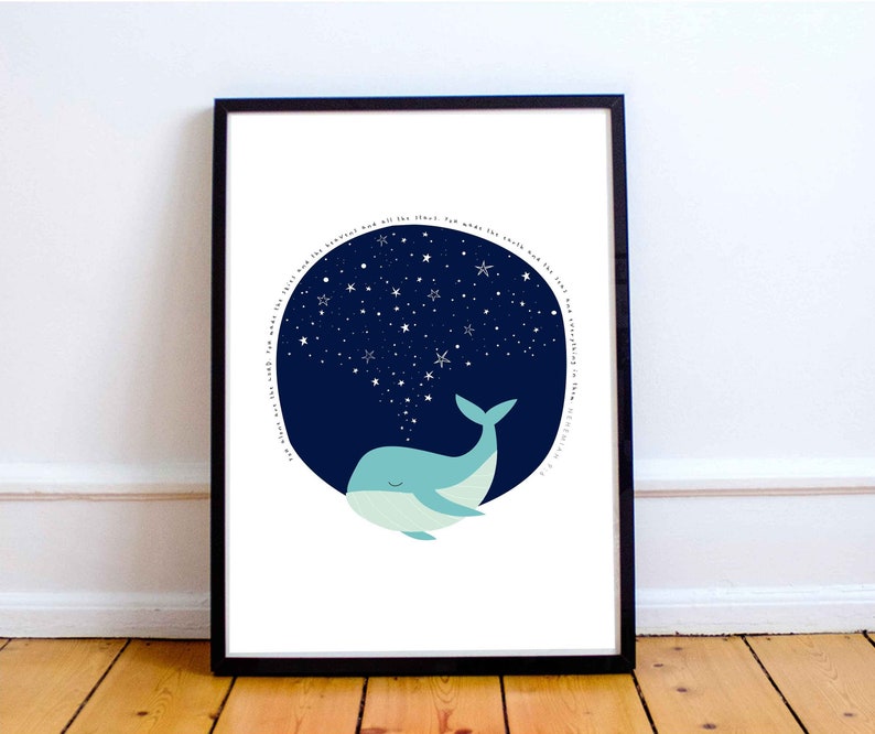 May include: A framed art print featuring a whimsical illustration of a blue whale. The whale is depicted with a spout of stars against a dark blue night sky filled with stars. The print has a white background and a black frame.