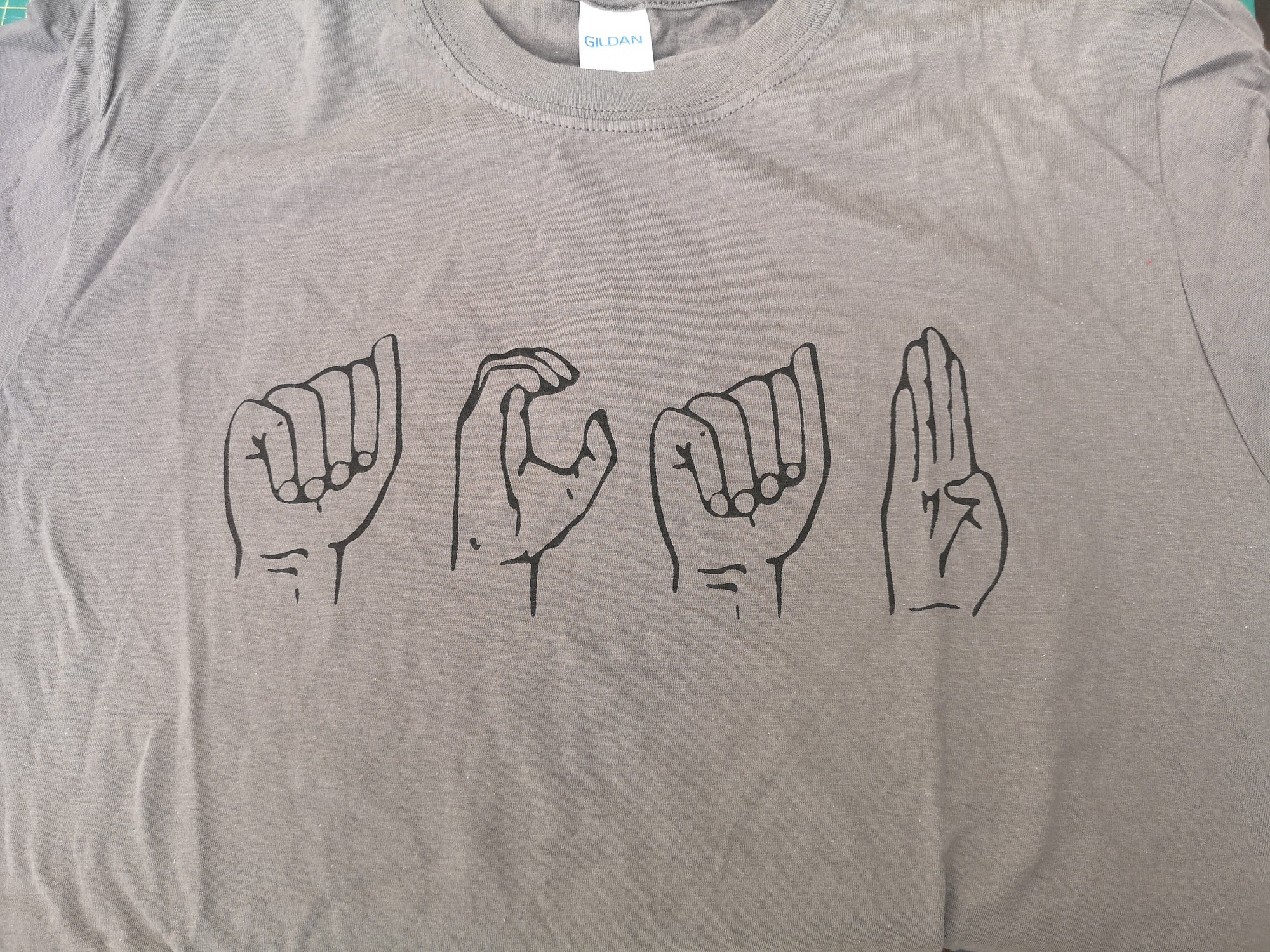 A.C.A.B t-shirt in International Sign Language