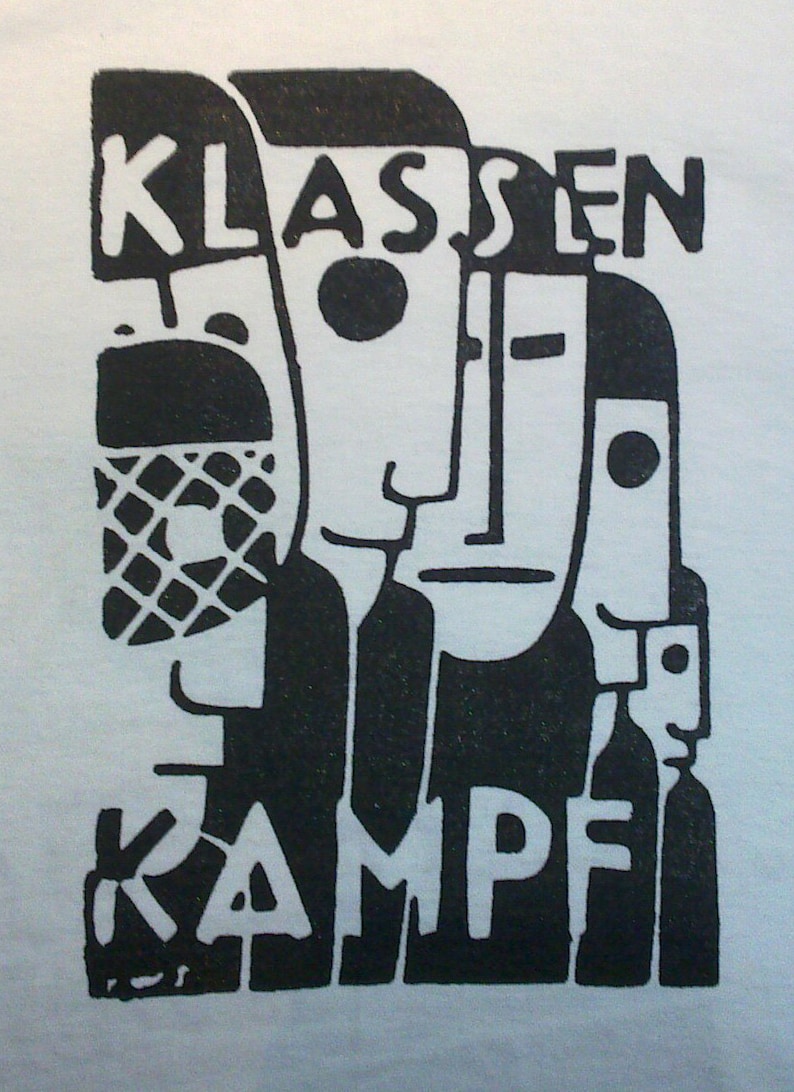 May include: Black and white graphic design with the text "KLASSEN KAMPF" in a bold, stylized font. The design features abstract figures with geometric shapes.