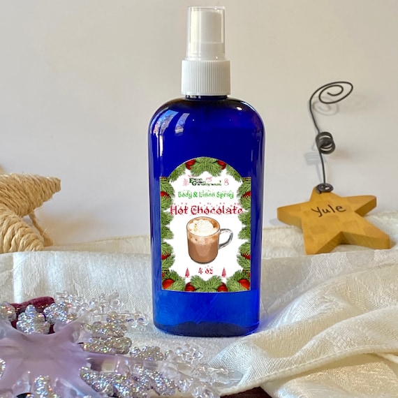 Hot Cocoa Room and Linen Spray, a decadent mist that wraps you in the rich, comforting scent of warm cocoa and melted sweetness. Vegan.
