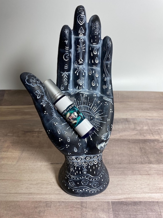 Absinthe Perfume Rollon, a provocative dance of sparkling citrus, intoxicating jasmine, and velvety musk. An intoxicating elixir. 10 ml