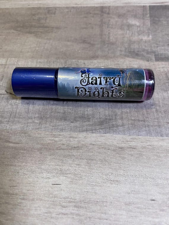 Fairy Nights is a whimsical roll-on perfume oil that sparkles with enchantment, scented with the dreamy sweetness of sugarplum. 10ml Vegan