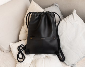 Furla Black Pebbled Leather Backpack Drawstring Suede Flap  display picture 1