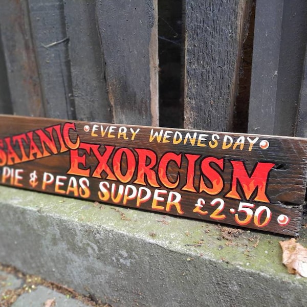 Hand painted vintage style horror sign, Satanic Exorcism Comedy Halloween decoration.