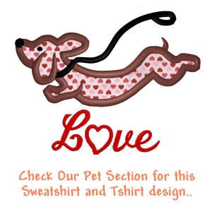 May include: An embroidered dachshund dog graphic with a pink and red heart pattern, a black leash, and the red text Love. Below is the text: Check Our Pet Section for this Sweatshirt and Tshirt design.. The design features a brown outline.